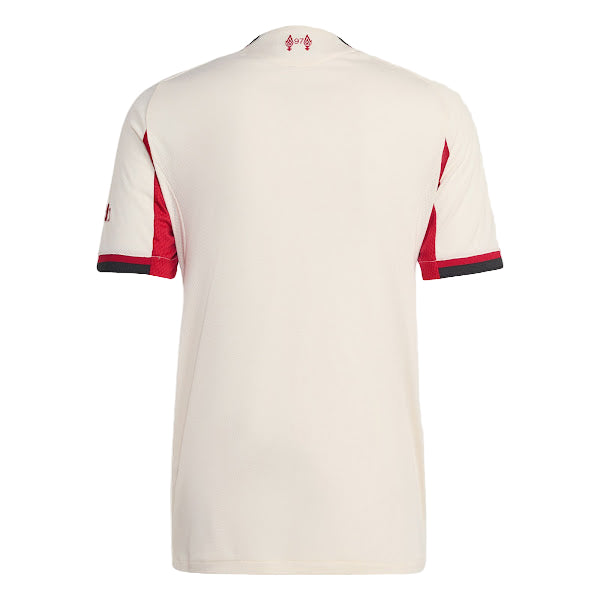 White t-shirt with red and blue accents on a light gray background